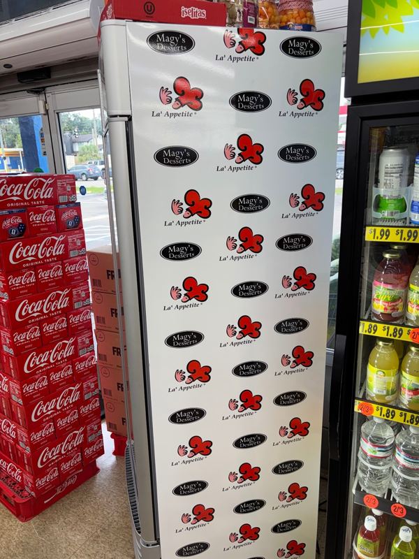 Display fridges wrapped with a dessert brand's logo pattern